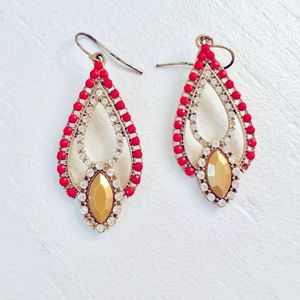 These are unique hot pink accented earrings.